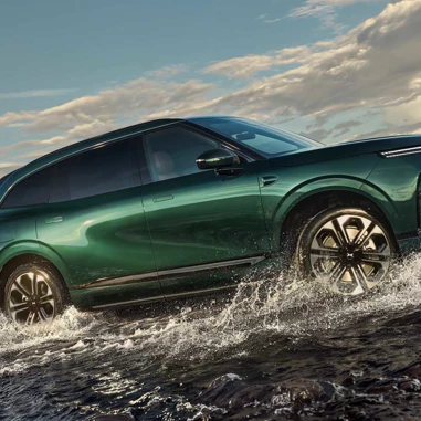 Green Car With Outdoor View In Motion 2